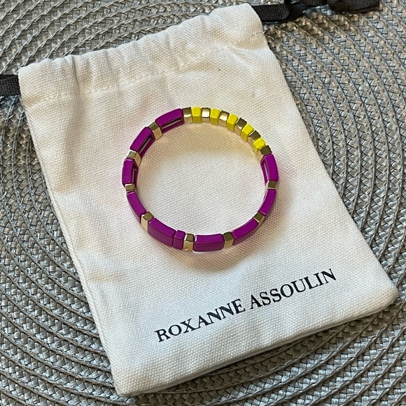 Roxanne Assoulin Enamel coated stretch bracelet with a gold tone logo - Picture 2 of 3